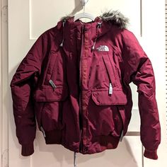 Tnf Brand Goose Down Jacket. Wine/ Maroon Color With Attached Faux Fur Trim On Hood. No Defects Or Notable Signs Of Wear And Tear. Smoke Free Home. So Warm! It Served Me Well During College Walking In The Snow! Most Women's Clothing From The North Face Can Run Small, So I Would Say It Fits Like A Women's *Xs*. Most Comparable Current Season's Style: Tnf Women's Artic Bomber Face Down, Maroon Color, North Face Jacket, Fur Trim, The Snow, Down Jacket, North Face, The North Face, Faux Fur