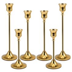 PRICES MAY VARY. Set of 6 Candlestick Holder : The candle sticks set come in 3 lengths (small - 2.4x6.3 inch; medium - 2.4x7.1 inch and tall - 2.4x8.3 inch) each of 2 units. Fits standard size candles and led taper candles.(Candles are not included.) European Retro Metal Design : Metal build with a very bright brass gold coating finish, these candle holders stand with a beautiful, stylish and elegant but show off finish. Vary in height candlelight easy to light the table and create a romantic at Gold Candle Stick With Tapered Candle, Gold Candles Holder, Gold Candle Sticks On Mantle, Brass Cabdlesticks, Wedding Decorations Gold, Gold Candle Stick Holders, Gold Taper Candle Holders, Gold Taper Candles, Gold Candlestick Holders