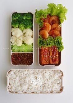 two trays filled with rice, meat and veggies on top of each other