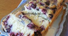 two slices of blueberry bread on a plate