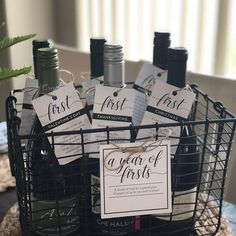 a basket filled with wine bottles sitting on top of a table