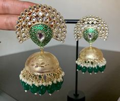 Green Kundan Polki Jhumka Earrings. Stylish Fancy Party Wear Jhumka Earrings . Height: 3 inch Width: 1.5 inch These Jhumka Ear Rings can be worn with all kind of traditional Outfits.These beautiful Earrings are handcrafted in brass alloy with pearl stones of very fine quality. Ideal Gift for Wife, Girls, Women, Girlfriend.Ethnic Wear. Can be worn for engagement and wedding parties. Handcrafted pair of earrings. Gives traditional look. Indulge in it or gift it and watch the compliments flow! It i Kundan Jhumka, Pakistani Earrings, Pink Pearl Earrings, Water Perfume, Store Jewelry, Gold Ring Designs, Indian Earrings, Fancy Party, Jhumka Earrings