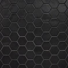 black hexagonal tiles are shown in this image