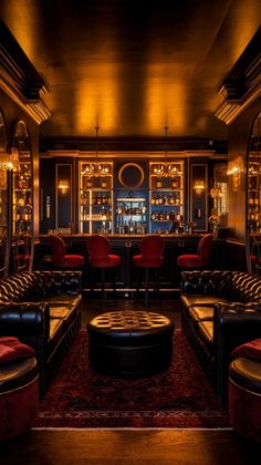 a dimly lit room with couches, tables and stools in front of a bar