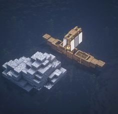 an aerial view of two floating structures in the water, one is made out of concrete blocks