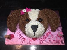 a birthday cake made to look like a dog