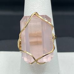 This Is A Beautiful Natural 26 Carat Rose Quartz 14k Wire Wrapped Handmade Ring Size 8.5. The Rose Quartz On This Ring Is Approximately 26 Carats And It Measures Approximately 23x15 Mm. The Wire On This Ring Is 10/20 Gold Filled Wire, Which Will Never Tarnish Or Change Colors. Rose Quartz Is Known As The Crystal Of Unconditional Love. It’s Said To Boost Feelings Of Self-Love And Foster Loving Relationships With Others. This Ring Would Be A Great Gift For A Jewelry Lover. This Ring Is One Of A Kind. Loving Relationships, Relationships Love, Unconditional Love, Jewelry Lover, The Rose, Womens Jewelry Rings, Handmade Ring, Wire Wrapped, Wire Wrapping