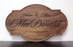 a wooden sign with the name and date on it