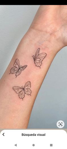 two butterflies on the wrist tattoo design for girls and women, one is black and white