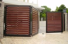 two gates with wooden slats on them