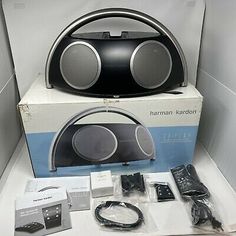 the harmman kartron portable stereo system is in its box and ready to be used