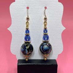 These Tensha blue rose earrings have a vintage feel to them. I accented the Tensha beads with sapphire Swarovski crystals, gold vermeil spacer beads and small round gold filled beads. They measure approximately 2 inches from the top of the gold filled earwire. Click here to see other earrings in my shop: https://www.etsy.com/shop/JewelryDesignsByRita?section_id=14765680 Tensha Beads, Gorgeous Bracelet, Rose Earrings, Blue Rose, Saint Louis, Purple Gold, Spacer Beads, Beautiful Bracelet, Gold Vermeil