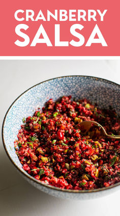 A bowl of fresh gingery cranberry salsa with bits of jalapeno.