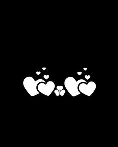 two hearts with paw prints on them are shown in the middle of a black background