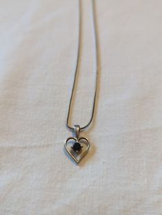 A Beautiful 925 silver necklace and heart pendant. 16" (41cm) Long Good Condition. Please check out our other listings for unique and unusual. Black Sterling Silver Heart Necklace For Anniversary, Black Heart-shaped Necklace For Formal Occasions, Black Heart-shaped Formal Necklace, Formal Black Heart-shaped Necklace, Adjustable Black Heart Pendant Necklace, Black Nickel-free Heart Pendant Necklace, Black Sterling Silver Heart Pendant Necklace, Spiritual Black Heart-shaped Necklaces, Black Heart-shaped Sterling Silver Necklace