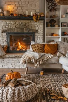 a living room filled with furniture and a fire place