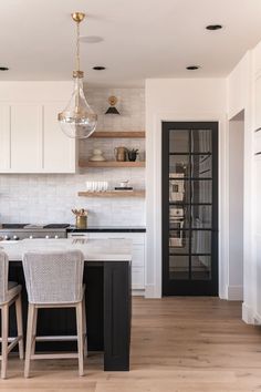 the kitchen is clean and ready to be used as a dining room or family room