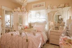 a bedroom decorated in pink and white