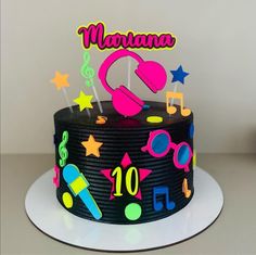 a birthday cake decorated with music notes and stars