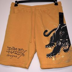 Ed Hardy Large Panther Yellow Double Sided Spell Out Y2k Men's Size M Shorts Nwt. Brand New, Never Worn, And Original Tag Still Attached. Comes From A Smoke Free Environment. Measurements (Lying Flat): Length From Waist To Hem 20” Inseam 8” Waist 16” Across Don Ed Hardy, Y2k Men, Yellow Shorts, Black Fleece, Sweat Shorts, People Shopping, Ed Hardy, Drawstring Shorts, Red Sweaters