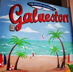 a painted sign on the side of a building that says'charleston'and palm trees