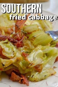 a white plate topped with cabbage covered in bacon