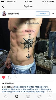 a man with a compass tattoo on his chest