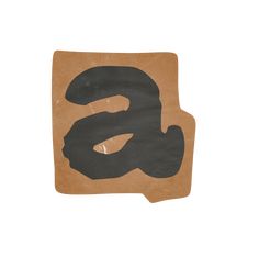 the letter s is made out of brown paper