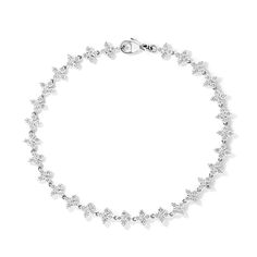 The 14K White Gold Blossom Lab-Created Diamond Tennis Bracelet is a timeless and elegant piece of jewelry that is sure to bring joy to the wearer. The bracelet is crafted in 14K white gold and features links made of shimmering lab-created diamonds in a classic blossom shape. The bracelet secures with a pear lobster clasp. This bracelet is perfect for any occasion, whether you are celebrating a special event or simply enjoying a day out. It is sure to add a touch of sophistication to any outfit. Delicate Diamond Jubilee Bracelet For Formal Occasions, Delicate Formal Diamond Jubilee Bracelet, Delicate Jubilee Diamond Bracelet For Formal Occasions, Delicate White Gold Diamond Jubilee Bracelet, Delicate White Gold Jubilee Diamond Bracelet, Delicate White Gold Jubilee Bracelet, Diamond Tennis Bracelet, Tennis Bracelet Diamond, Diamond Bracelets