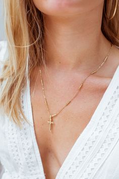 Plays well with others! Layer it on or wear alone, this unique chain + cross duo match everything! Rock on a daily basis, it's made to last! 24k gold filled 18'' long Item is made to order and may take 2-12 business days to ship.