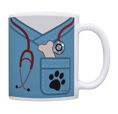 a coffee mug with an image of a dog's collar and stethoscope on it