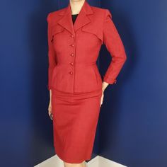 1950s Gorgeous Vintage Skirt Suit With Matching Skirt And Blazer By Rothmoor. The Blazer Has All The Best 50s Details Such As Interesting Cuts, Cool Buttons, And Wide Collar. The Blazer Is Fully Lined, But The Skirt Is Not. The Skirt Is A Basic Pencil Skirt With A Kick Pleat In The Back And Zipper On The Side. Excellent Condition With No Rips, Stains, Or Holes. Jacket Bust 38 Inches Waist 28 Hip 38 Shoulder To Shoulder 15.5 Shoulder To Hem 23.5 Skirt Waist 27 Hip 38.5 Length 26 The Skirt Has Ple Tailored Red Long Sleeve Skirt Suit, Classic Red Skirt Suit For Work, Fitted Vintage Red Outerwear, Vintage Red Skirt Suit For Formal Occasions, Fitted Red Skirt Suit With Long Sleeves, Red Fitted Long Sleeve Skirt Suit, Matching Skirt And Blazer, 50s Suit, Grease Costume