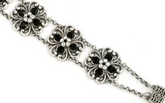 "A piece of beautiful and impressive jewelry for women. It can be wear on evening special occasions and even as a bracelet for the Mother of the bride or groom. The bracelet was named Francis and made from antique silver-plated and set with statement black Swarovski Crystals. Measurements: Bracelet length: 6.8\" (17.5cm) You can combine the bracelet with a silver and black pair of earrings or an elegant necklace: https://www.etsy.com/il-en/listing/478981619/mother-of-the-bride-earrings-mother-of Elegant Adjustable Jewelry For Evening, Silver Jeweled Bracelets For Party, Elegant Silver Bracelets For Gift, Elegant Silver Bracelet For A Gift, Elegant Antique Silver Metal Jewelry, Silver Metal Bracelet With Jewels, Victorian Metal Bracelet, Silver Embellished Metal Bracelets, Silver Metal Bracelets With Jewels