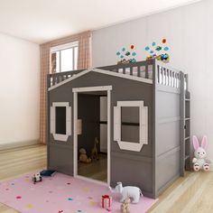 a child's bedroom with a lofted bed and play house in the corner