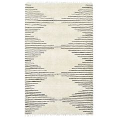 a rug with black and white stripes on the bottom, in front of a white background