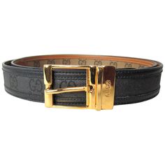 Gucci Black with Gold Tone Belt Buckle. Signature GG on the canvas with leather trim. This was purchased in the early 90s and still has the tag on it. Labeled a size 44 - Measures 1.15 inches wide. First belt hole is at 41 inches and the belt is 47 inches with the buckle. This is out of a massive collection of Contemporary designer clothing as well as Hopi, Zuni, Navajo, Southwestern, sterling silver, costume jewelry and fine jewelry from one collector. Be sure to check our store front for more fabulous pieces from this collection. We have been selling this collection on 1st dibs since 2013. You can Follow us via storefront as well. Thank you, Any questions please call, email or hit contact. Designer Belt, Designer Belts, Black Leather Belt, Vintage Belts, Gucci Belt, Gucci Black, Gucci Handbags, Canvas Leather, Belt Size