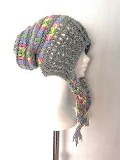 a crocheted hat on top of a mannequin head