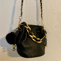 Black & Gold Bag Perfect For Fall Black Bucket Bag With Chain Strap For Everyday, Black Bucket Bag With Chain Strap, Black Bucket Shoulder Bag With Chain Strap, Black Bag With Chain Strap For On-the-go, Black Bags With Chain Strap, Trendy Black Bucket Bag With Gold-tone Hardware, Chic Black Bucket Evening Bag, Gold Bag, Leather Handbag