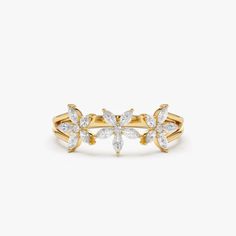 "Marquise Cut Diamond Flower Ring / 14k Gold Marquise Diamond Multi-Flower Ring / Stacking Diamond Ring by Ferko's Fine Jewelry * Made to Order * Gold Kt: 14K (also available in 18K) * Available Gold Color: Rose Gold, Yellow Gold, White Gold * Width: 6.25 MM * Height: 2.2 MM * Marquise Diamond: 15 Pcs 3 x 1.5 MM * Round Diamond: 3 Pcs 1.30MM * Diamond Carat Weight: 0.47 ctw * Diamond Color-Clarity: G Color VS Clarity If you have any additional questions about this ring, just hit the \"Message Ferko\" button and we will get back to you within a few hours. ▶ See more of our Diamond Rings - http://etsy.me/2lwKUl8 ▶ See our storefront here - http://etsy.me/2lUcVnH  ▶ All store sections here * Diamond Rings - http://etsy.me/2lwKUl8 * Diamond Earrings - http://etsy.me/2lyqVBP * Diamond Necklace Diamond Flower Ring, Diamond Stacking Rings, Gold Armband, Natural Gemstone Ring, Marquise Cut Diamond, Ring Stacking, Ruby Jewelry, Diamond Carat, Diamond Flower