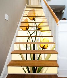 the stairs are painted with yellow flowers on them