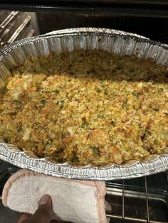 a large casserole dish is in the oven ready to be cooked and put into the oven