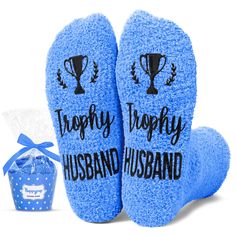 GIFTS FOR HUSBAND: Looking for a gift for your beloved? These duck blue socks, sewn with a hilarious hidden message that reads "Trophy Husband", make great gag gifts for your husband. SIZE & MATERIAL: These fuzzy socks are made of plush coral fleece, providing ultimate comfort and warmth. Designed to fit men's shoe sizes 6-10. Our fuzzy socks also feature black non-slip soles, ensuring your safety on wood and tile floors. CUPCAKE PACKAGING: To ensure easy transportation, they are not assembled.