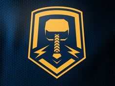 an image of a helmet with lightning bolts in the center on a dark blue background