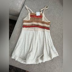 Brand New Flowy Tank Top. The Top Half Looks Like It’s Crocheted. Size X-Small From Free People Bohemian Knit Top For Summer Day Out, Casual Crochet Top For Fall Vacation, Trendy Vacation Tops With Crochet Trim, Casual Summer Tops With Crochet Trim, Multicolor Knit Top For Summer, Casual Summer Crochet Top With Crochet Trim, Casual Fitted Top With Crochet Trim, Casual Crochet Top For Vacation, Casual Multicolor Crochet Top