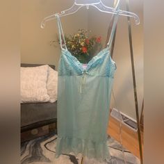 Sexy, See-Through Top And Panty. Never Worn! Size L. Aqua With Yellow Bow. 20” From The Bustline To Bottom. Panty Is A T/G String. Sheer Stretch Sleepwear For Loungewear, Victoria's Secret Blue Sheer Sleepwear, Victoria's Secret Sheer Blue Sleepwear, Victoria's Secret Camisole For Loungewear, Victoria's Secret Fitted Sleepwear For Lounging, Fitted Victoria's Secret Sleepwear For Lounging, Blue Lace Sleepwear For Loungewear, Flirty Victoria's Secret Sleepwear For Loungewear, Blue Spaghetti Straps Sleepwear