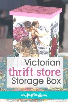 the victoria thriftstore storage box is sitting on top of a table