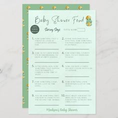 a baby shower game with ducks and flowers on the front, in mint green paper