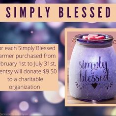 a glass jar filled with candy sitting on top of a table next to a sign that says simply blessed