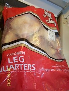 a bag of chicken leg quarters sitting on top of a counter