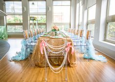 the table is decorated with gold sequins and pearls